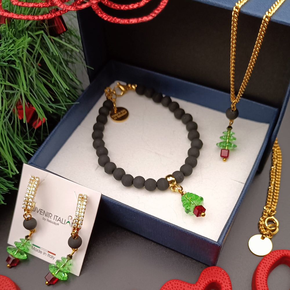 Set di gioielli natalizi con bracciale, collana e orecchini con pietra lavica e vetro di Murano con ciondoli albero di Natale e scritta "Buone Feste"