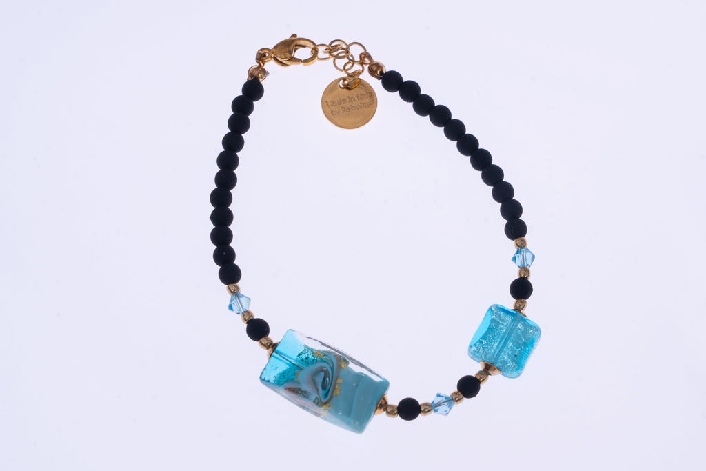 Bracciale con perle geometriche by ungioielloperte, pietra lavica e vetro murano
