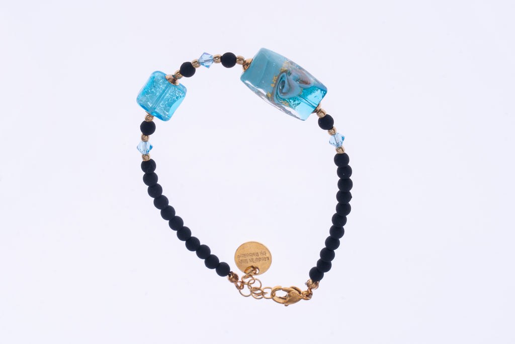 Bracciale con perle geometriche by ungioielloperte, pietra lavica e vetro murano